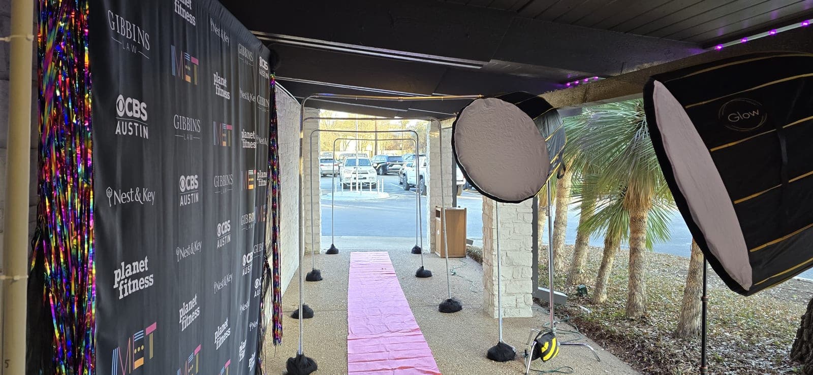 Event production setup with lighting and backdrop